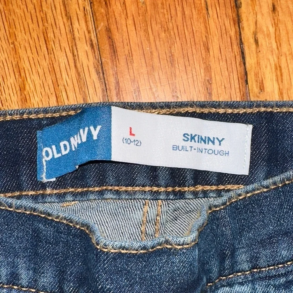 Old Navy girls pull on Slim Jeans in Light and Dark Blue